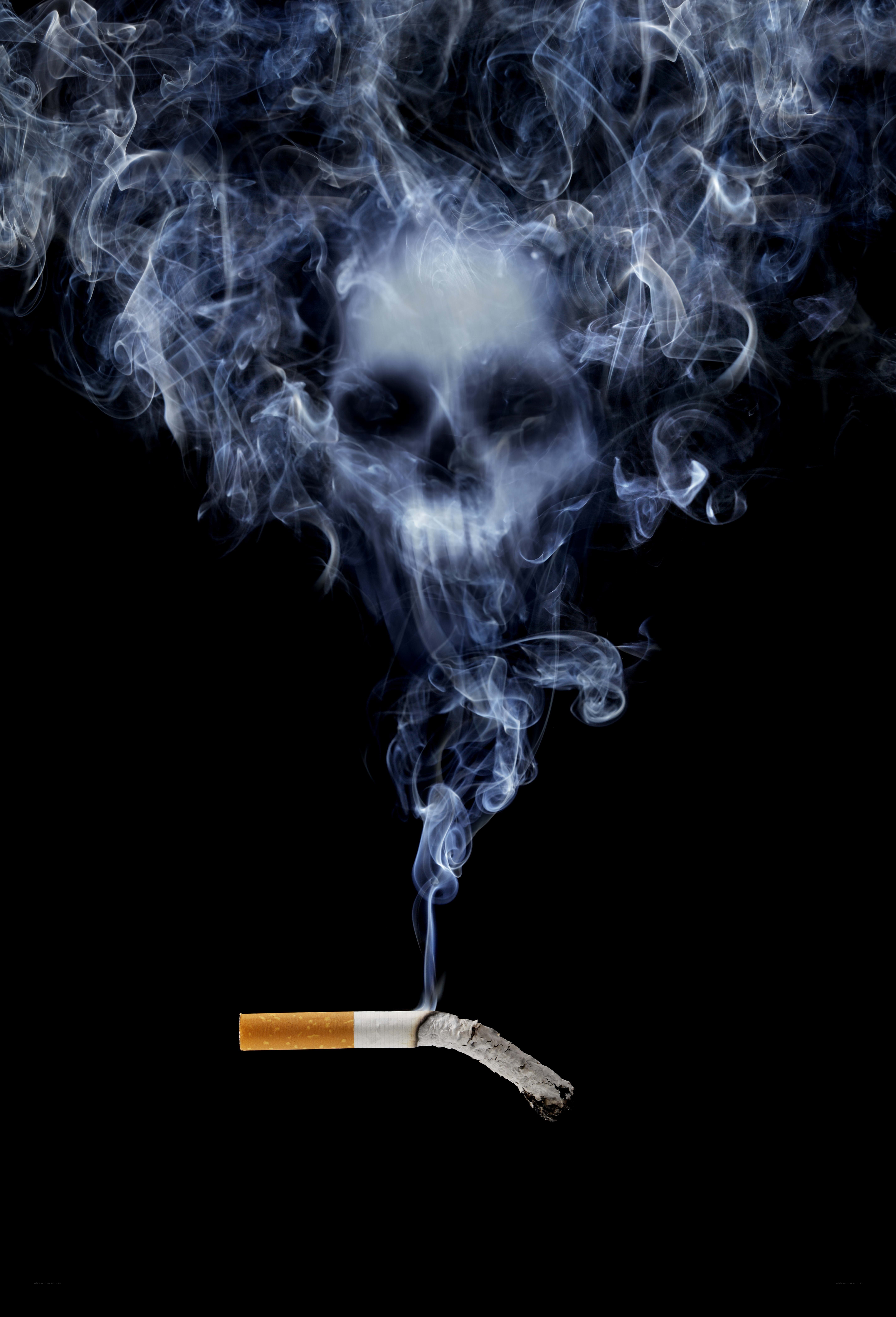 smoking cigarette with skull smoke
