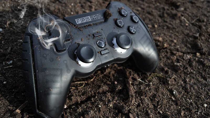 Smoking game controller in dirt