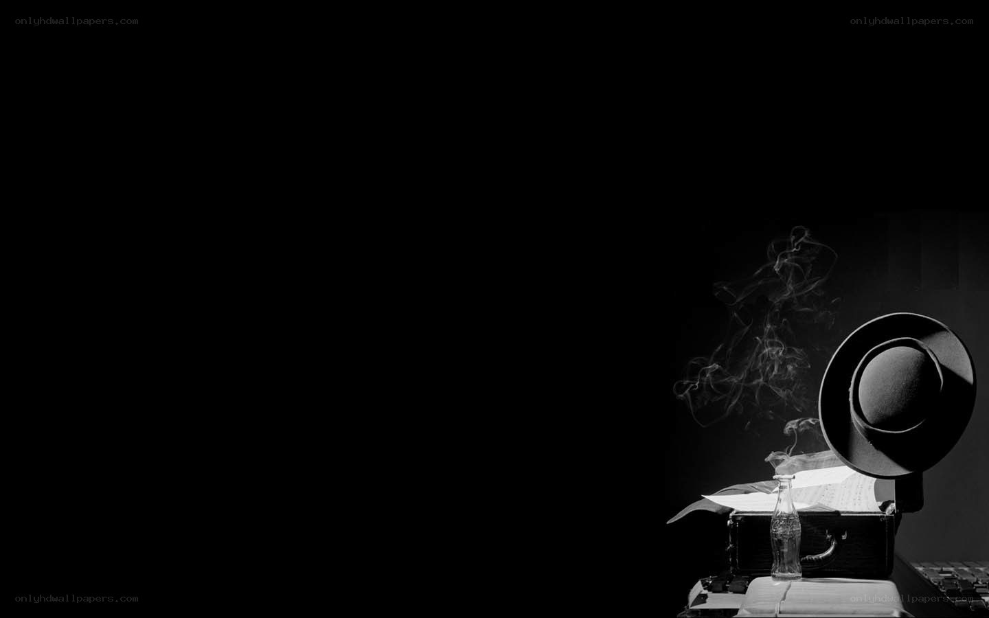 smoking hat on typewriter