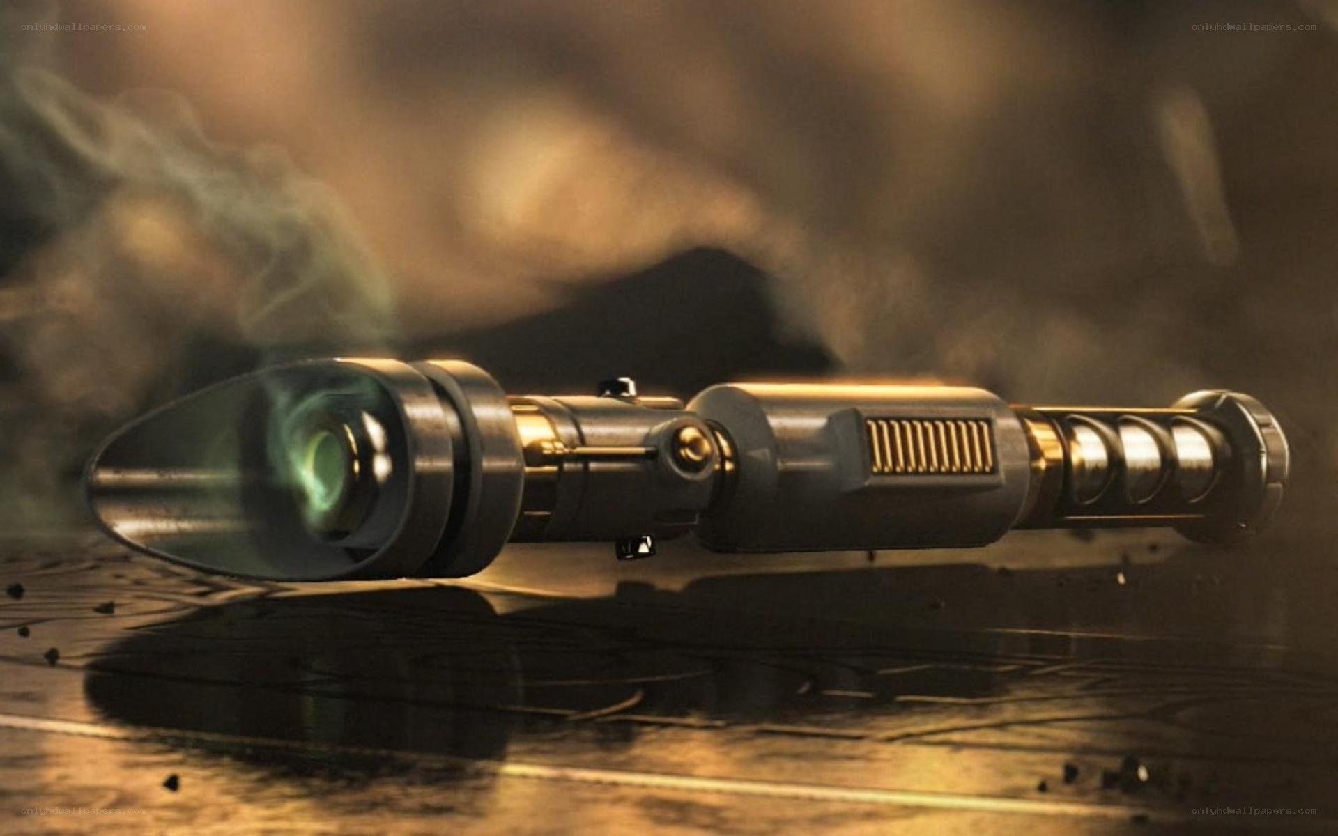smoking lightsaber on ground