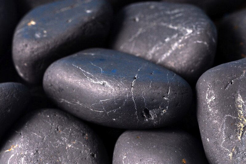 smooth black river stones