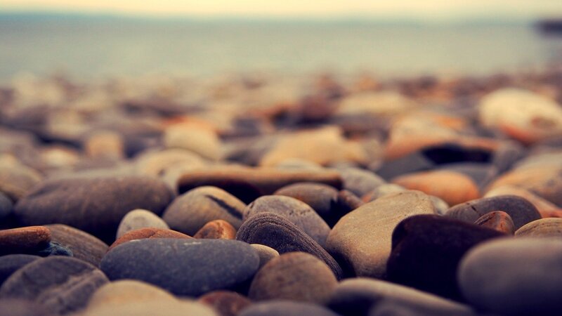 Smooth Pebbles on Beach — Gray, Calm, Sunset, Photograph