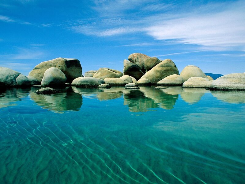 Smooth Rocks in Clear Water — Blue