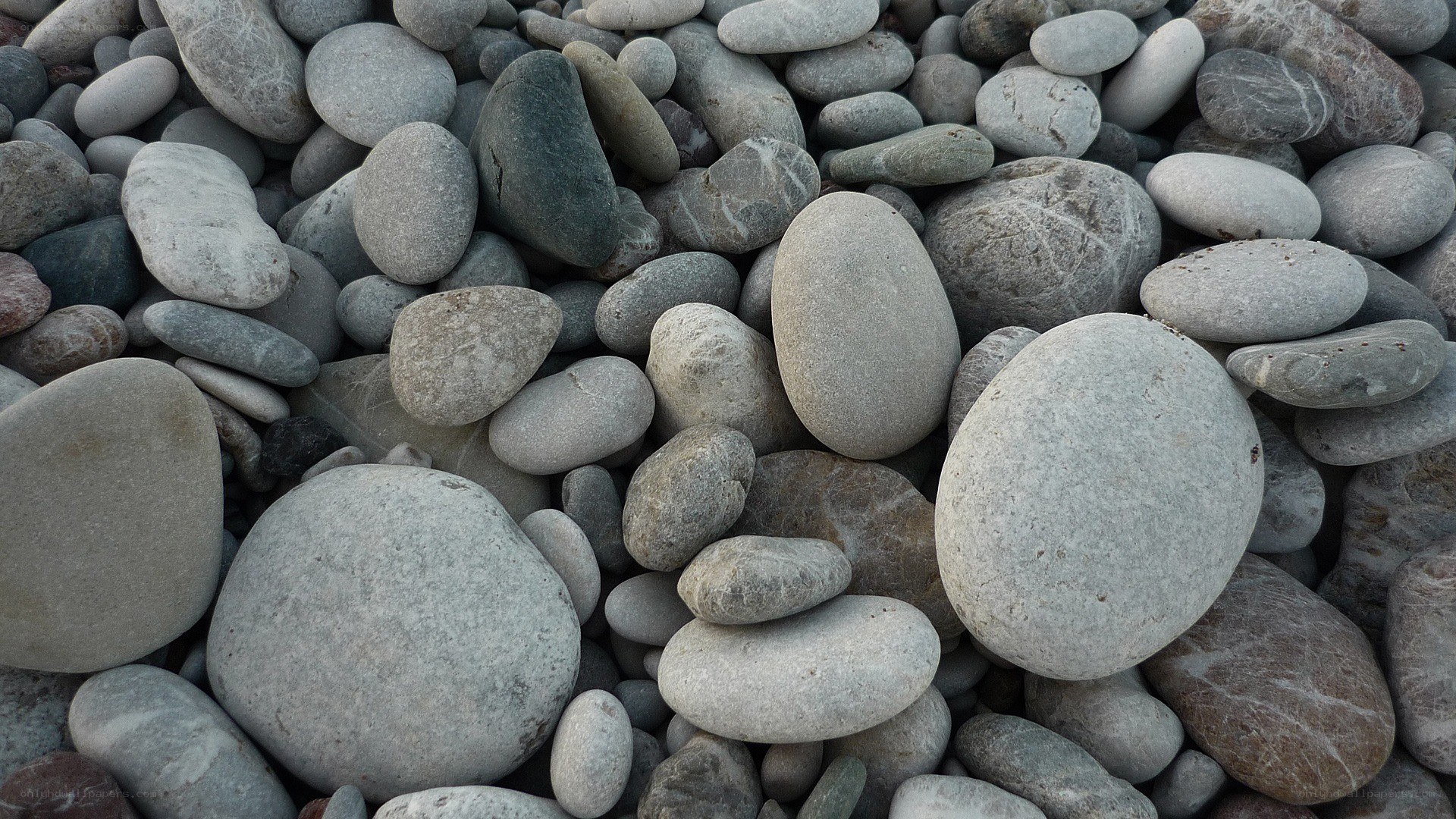 smooth stones on a beach