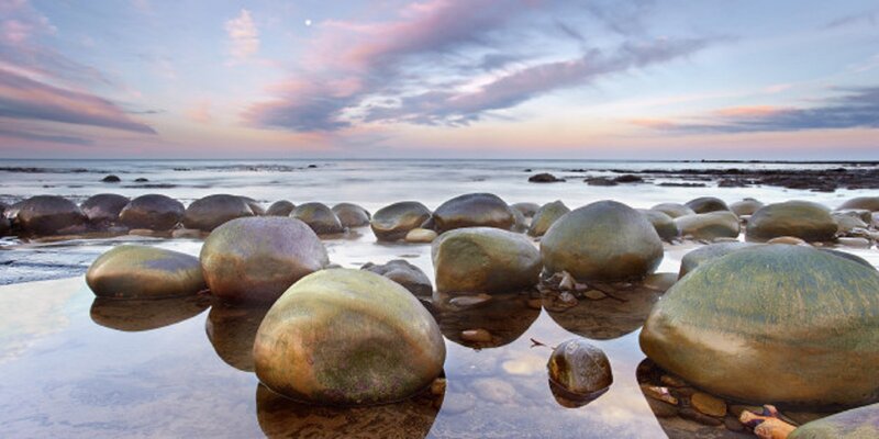 Smooth Stones on Beach — Blue