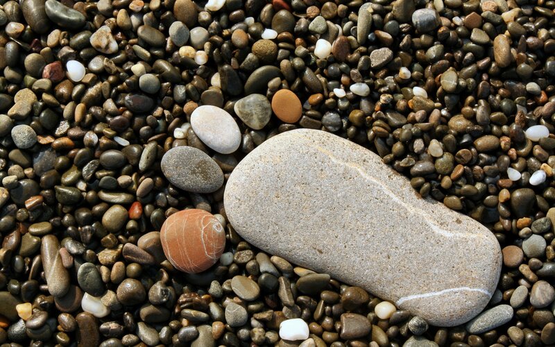 Smooth Stones on Beach — Gray, Calm