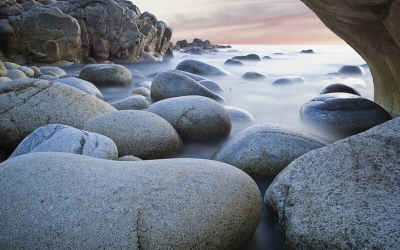 Smooth Stones on Beach — Gray