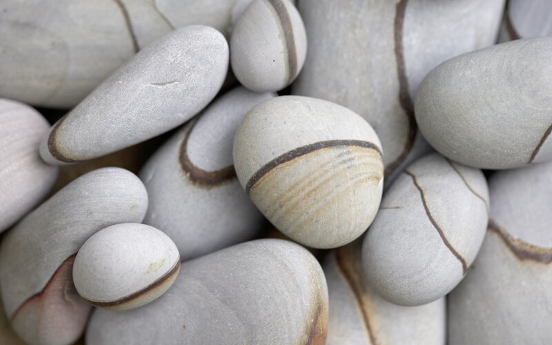 smooth stones with bands