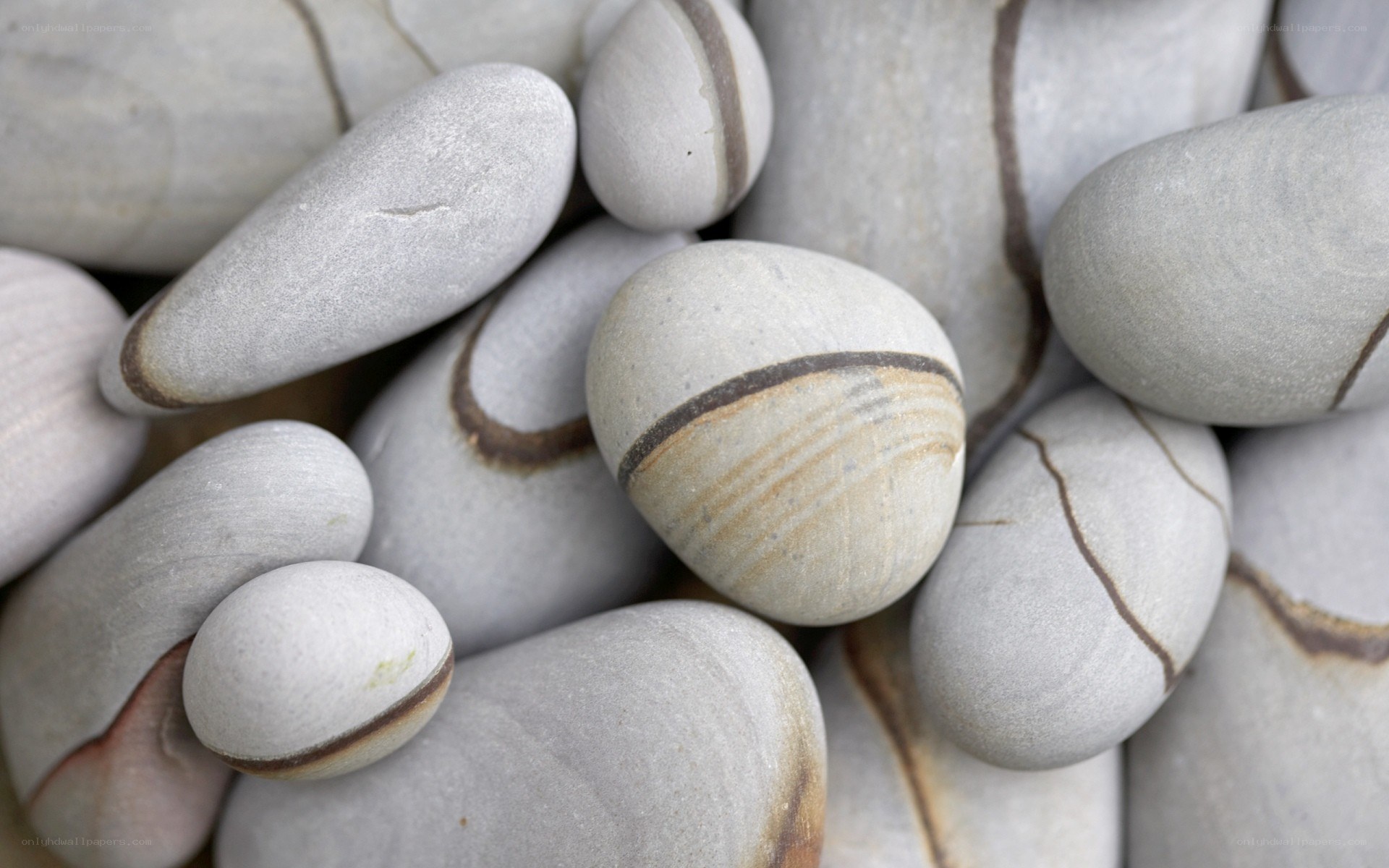 smooth stones with bands
