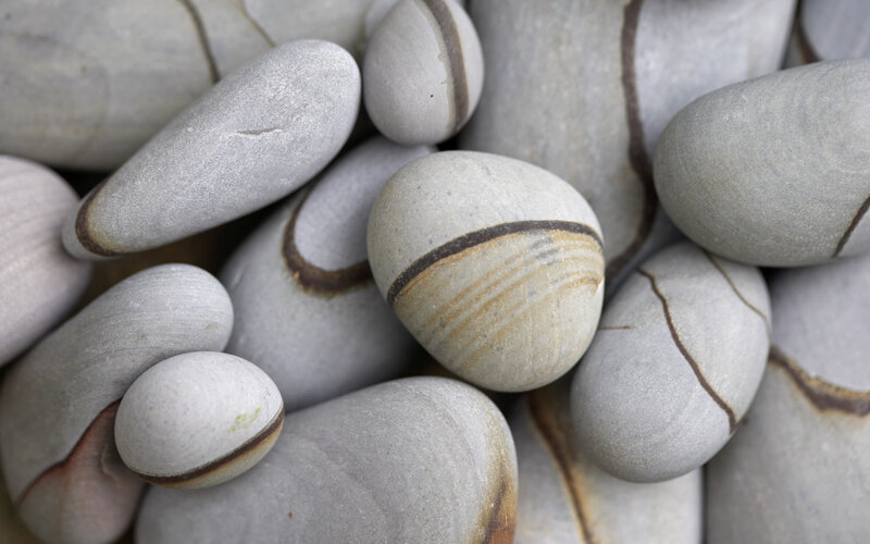 smooth stones with bands