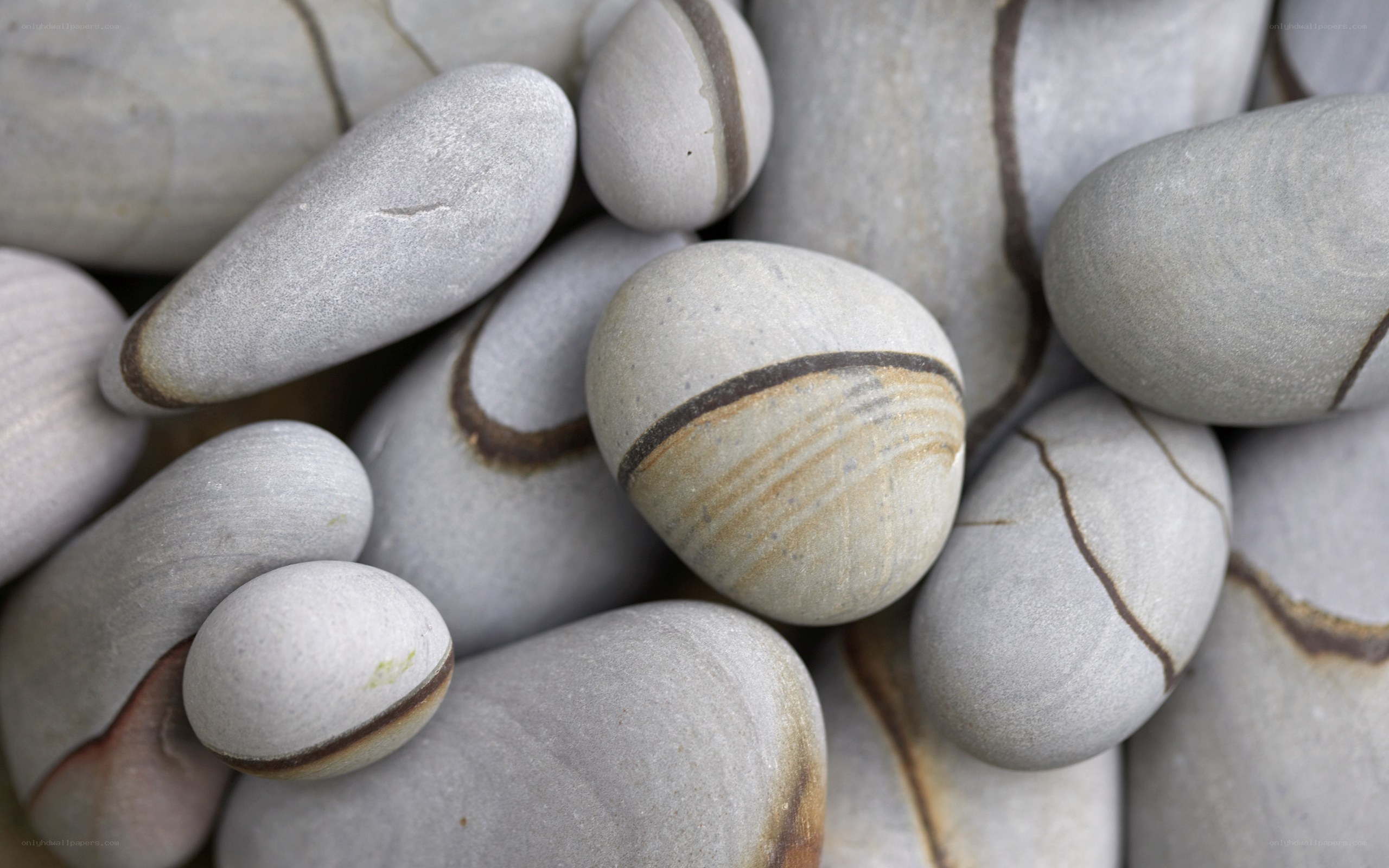 smooth stones with bands