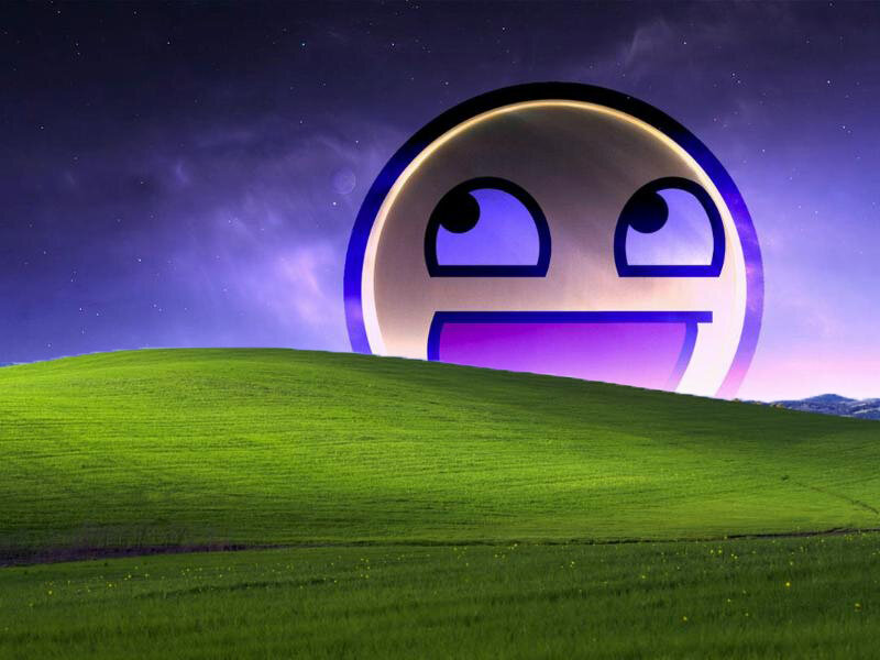 Smug face over green hills