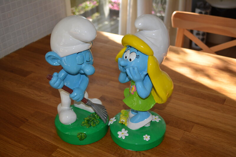 Smurf Figurines on Table