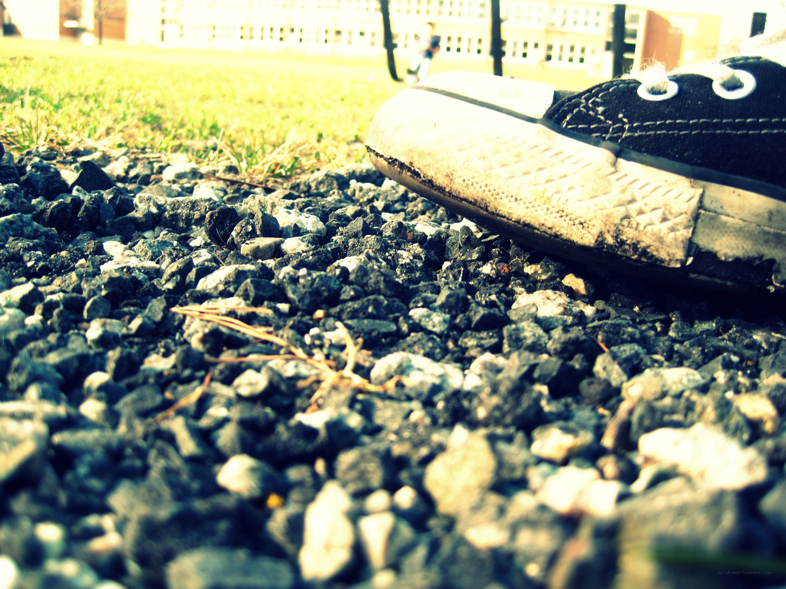 sneaker on gravel ground