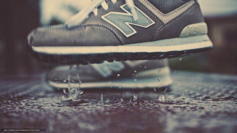 sneaker splashing in puddle
