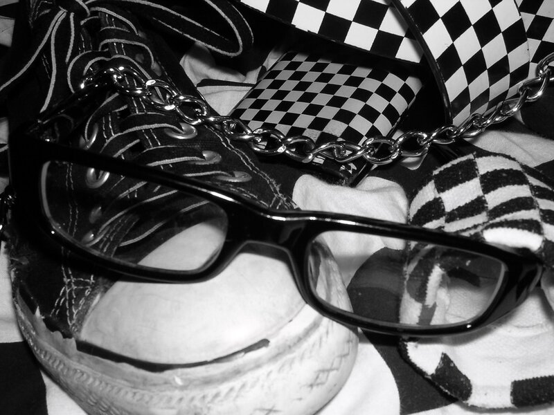 sneakers and glasses with chain
