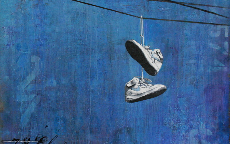 Sneakers Hanging on Wire
