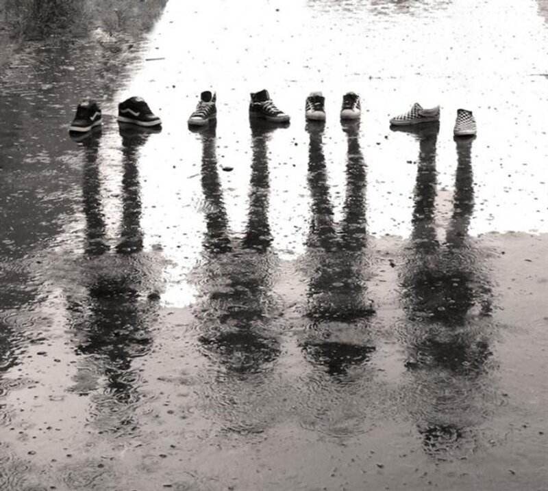 sneakers in a puddle