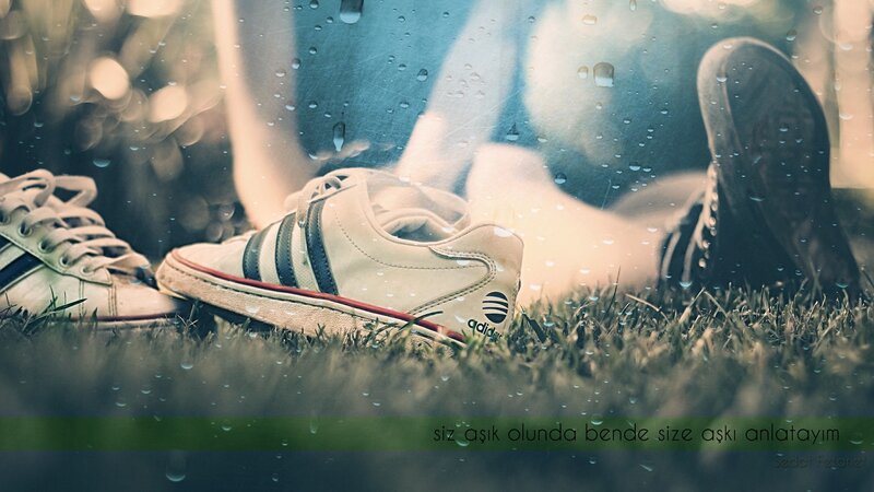 sneakers on grass in rain