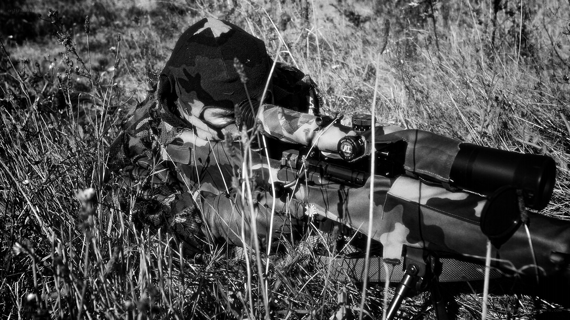 sniper in camouflage gear