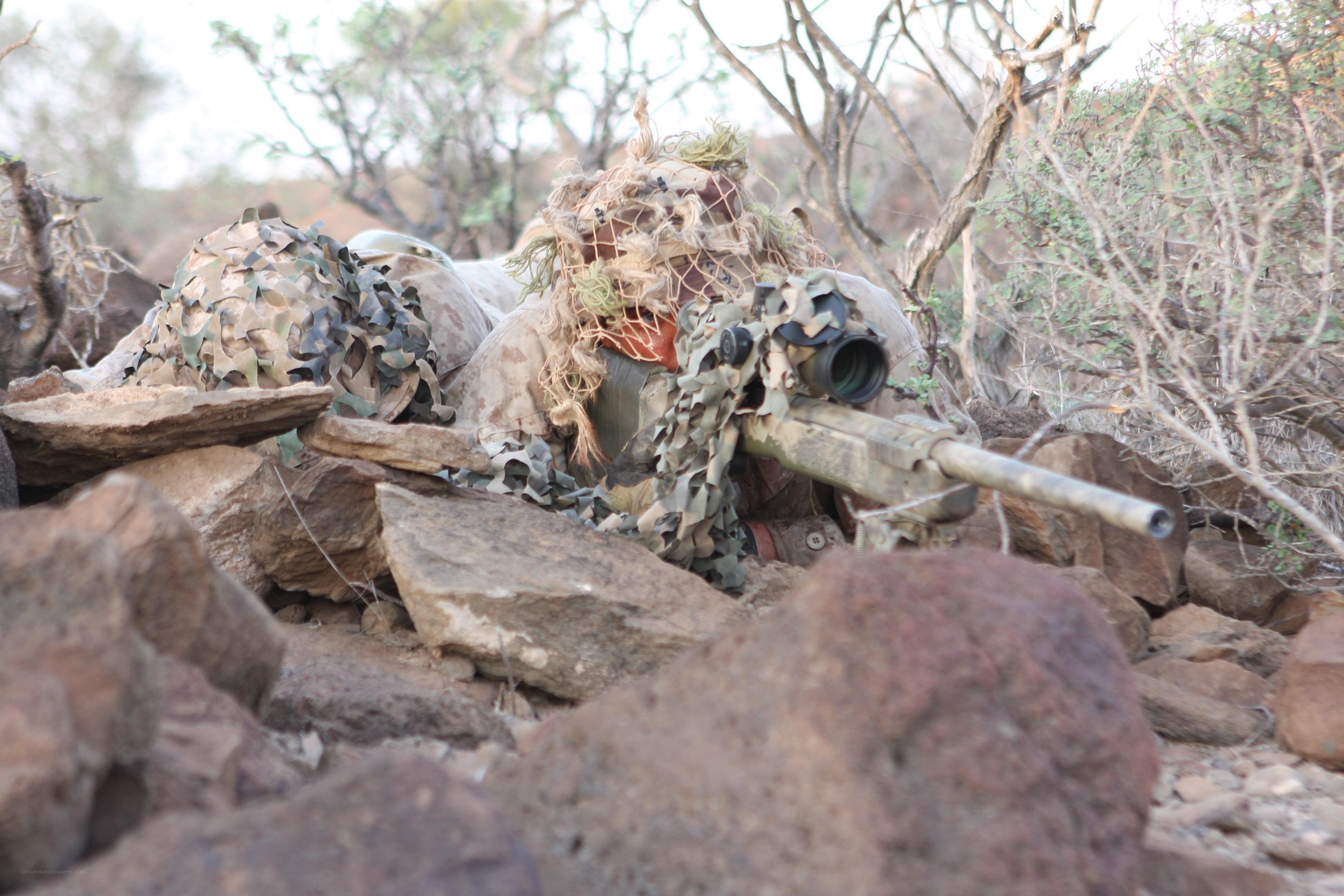 sniper in desert camouflage