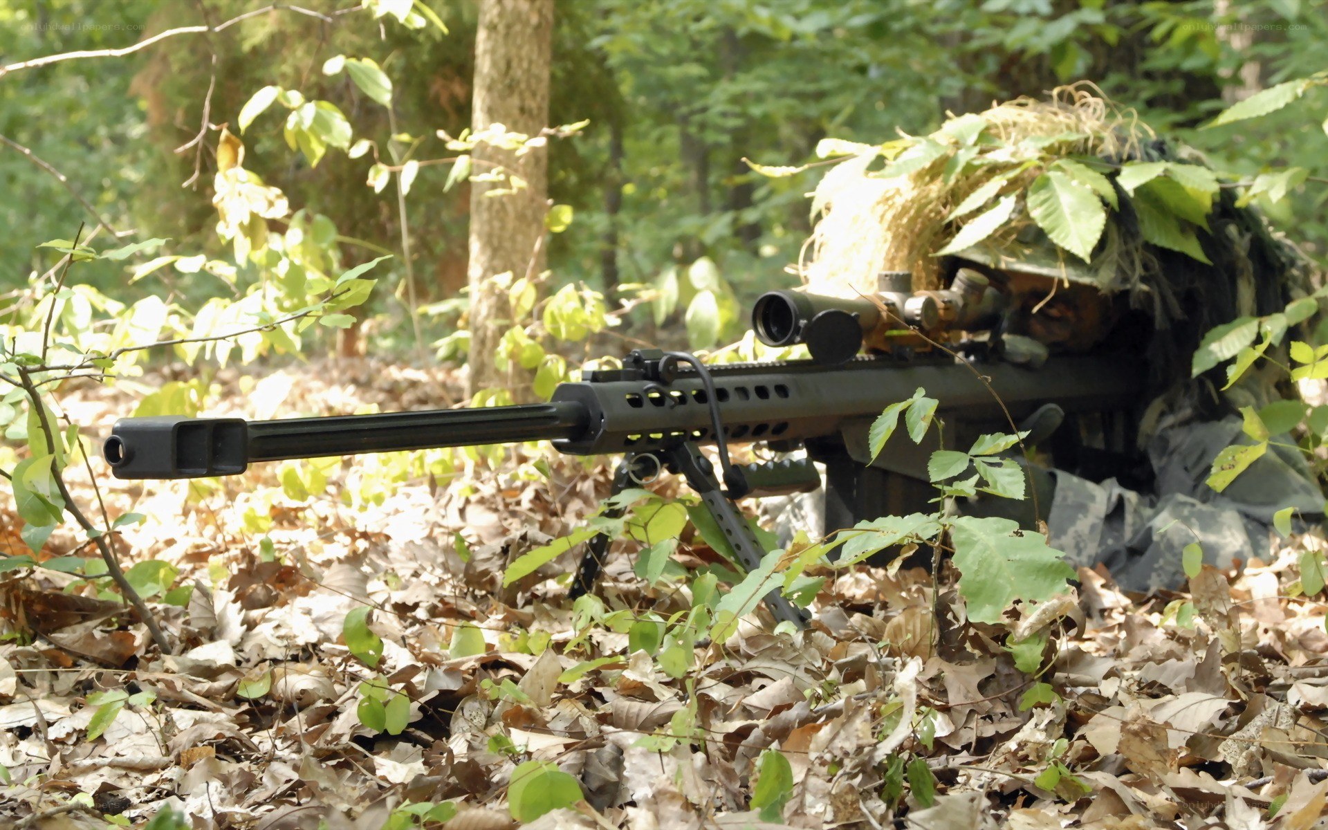sniper in forest camouflage