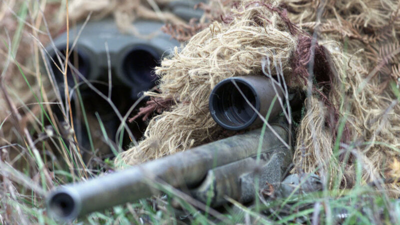 sniper in ghillie suit