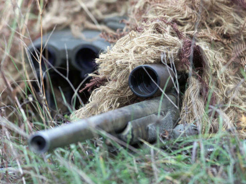 sniper in ghillie suit