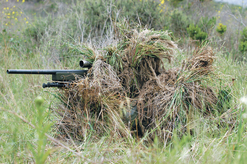 sniper in ghillie suit