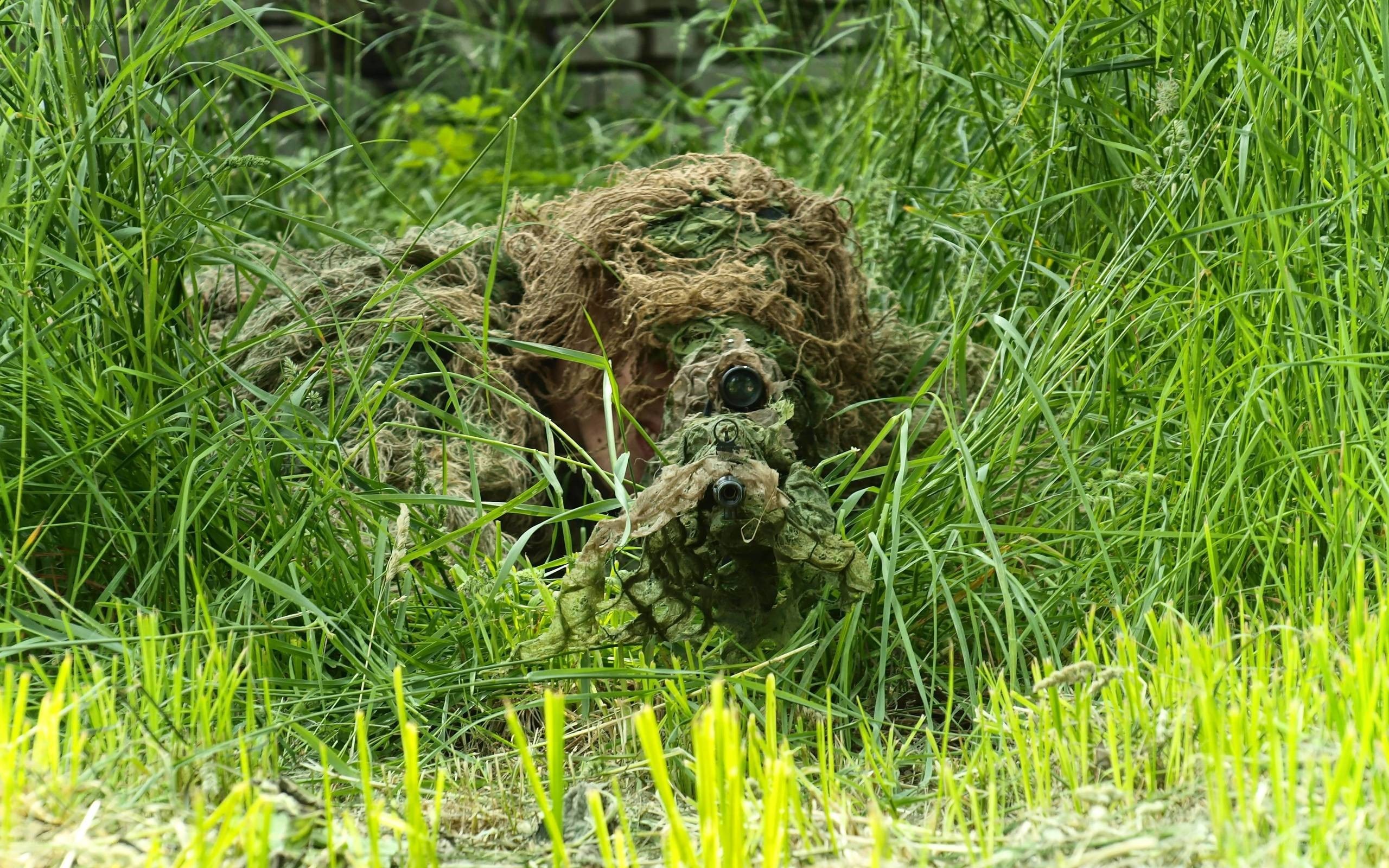 sniper in ghillie suit