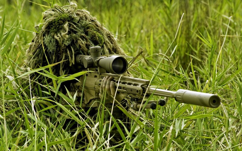 sniper in ghillie suit