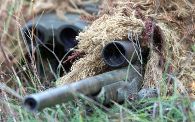 Sniper in Ghillie Suit — Green, Tense, Photograph