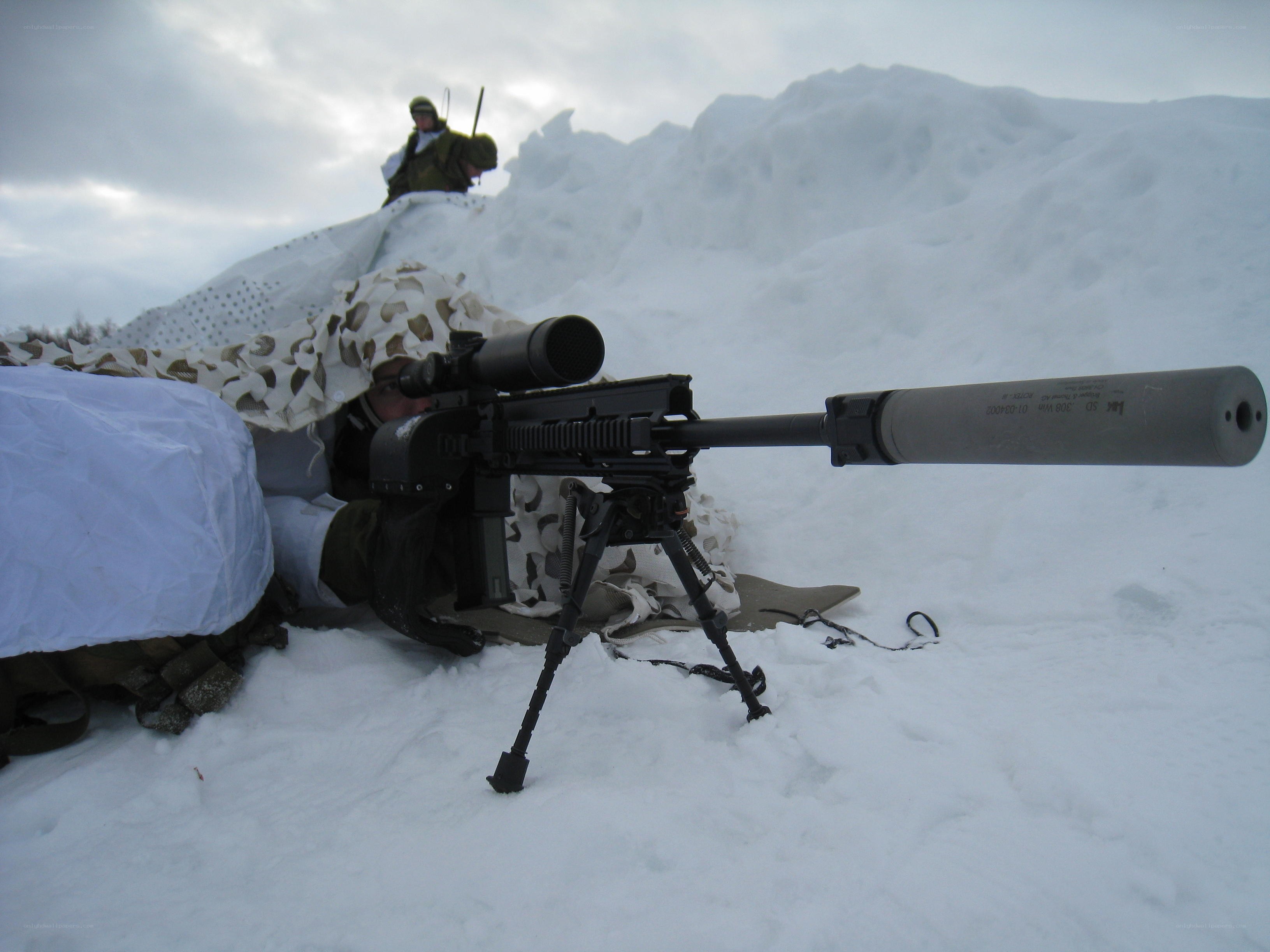 Sniper in snowy terrain