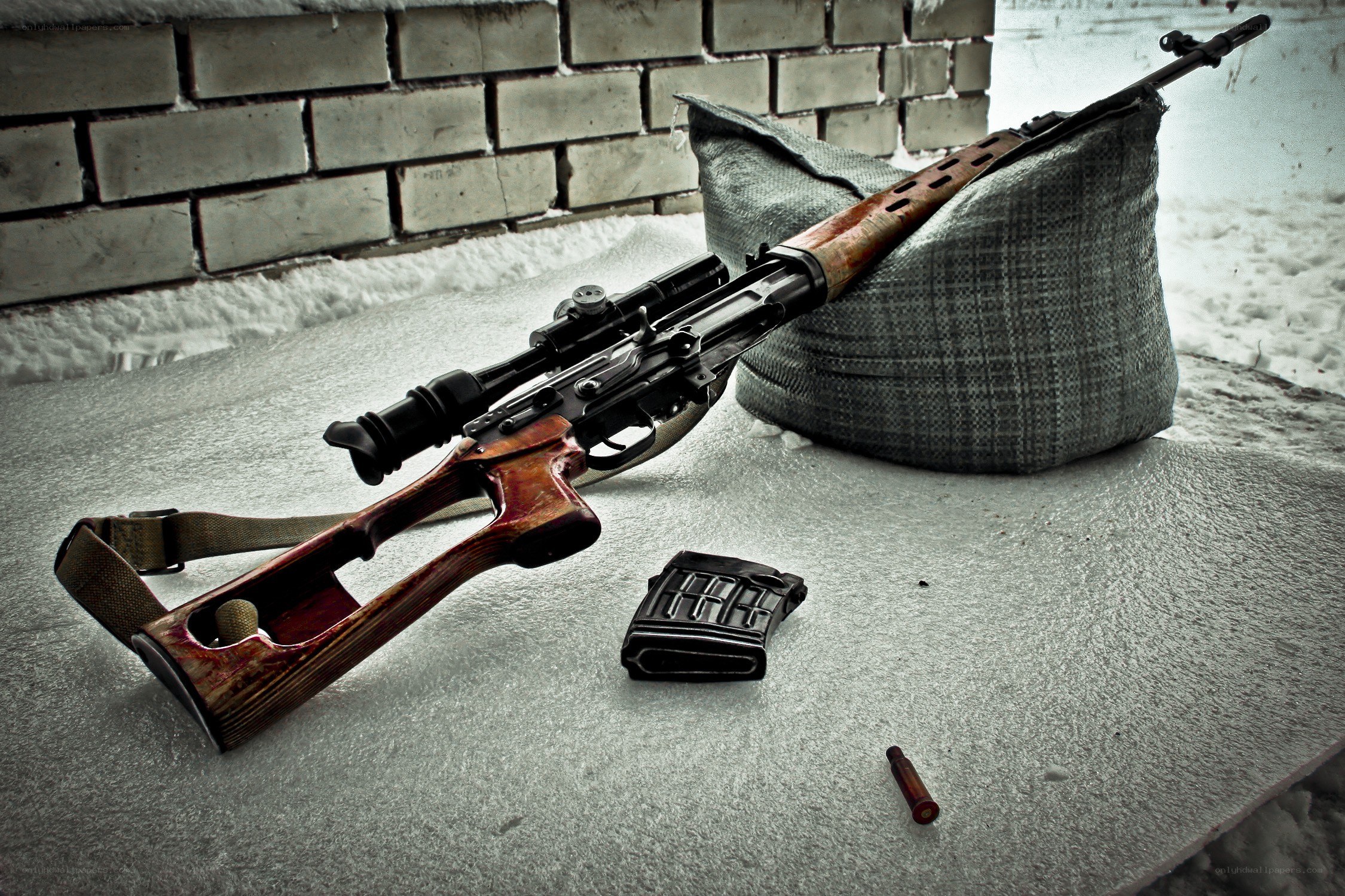 sniper rifle in snow