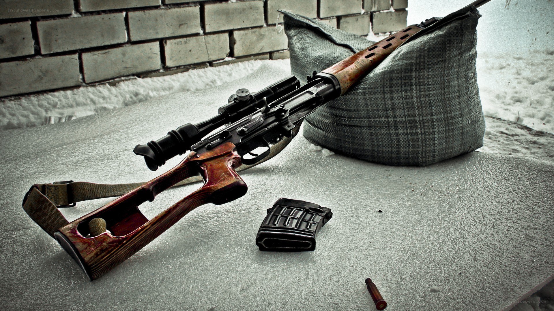 sniper rifle in snow