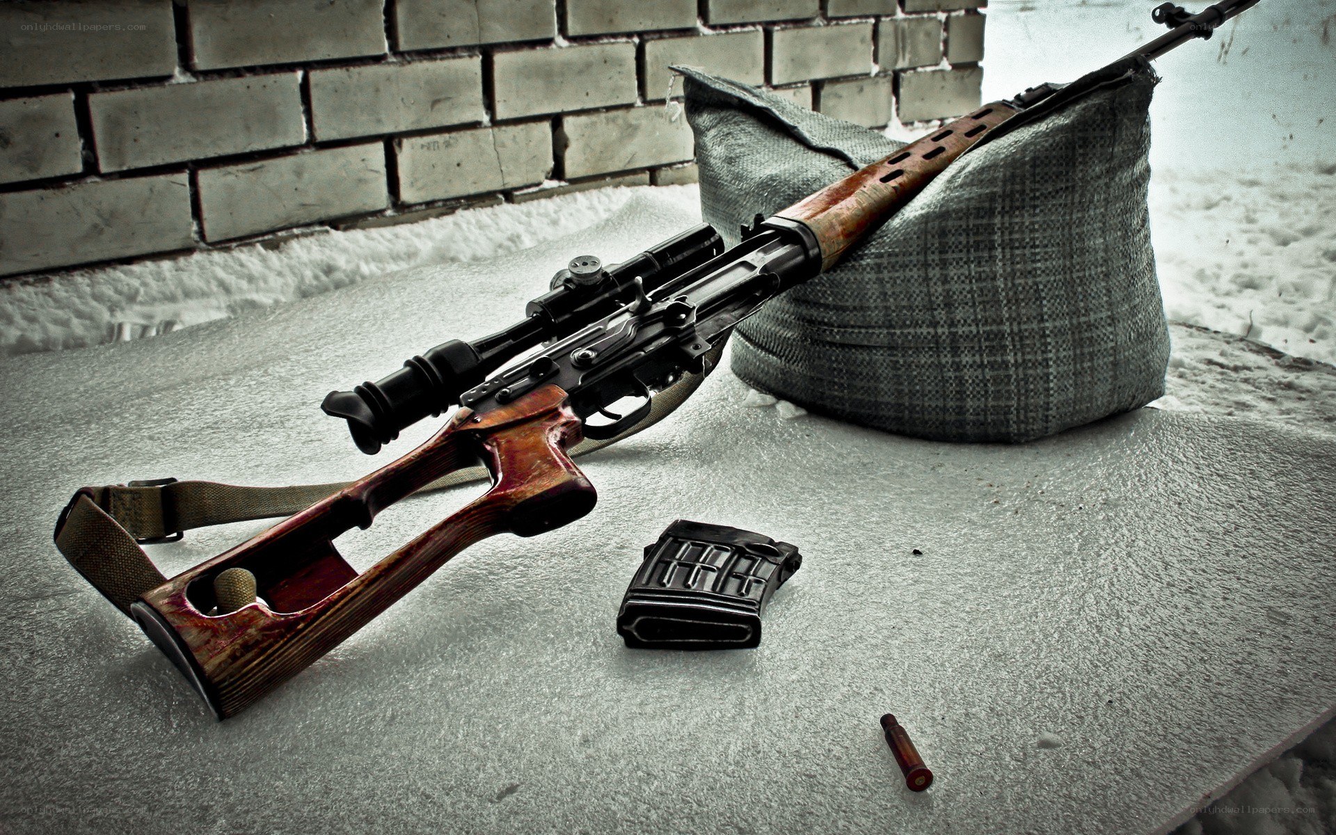 sniper rifle in snow