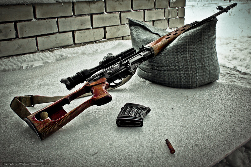 sniper rifle in snowy setting