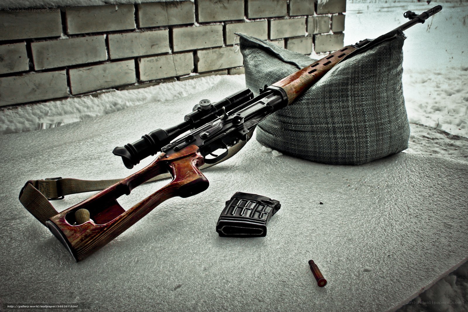sniper rifle in snowy setting