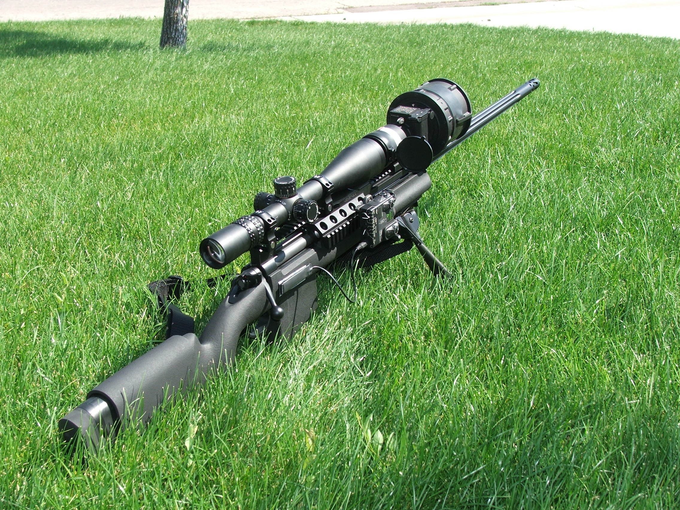 sniper rifle on grass