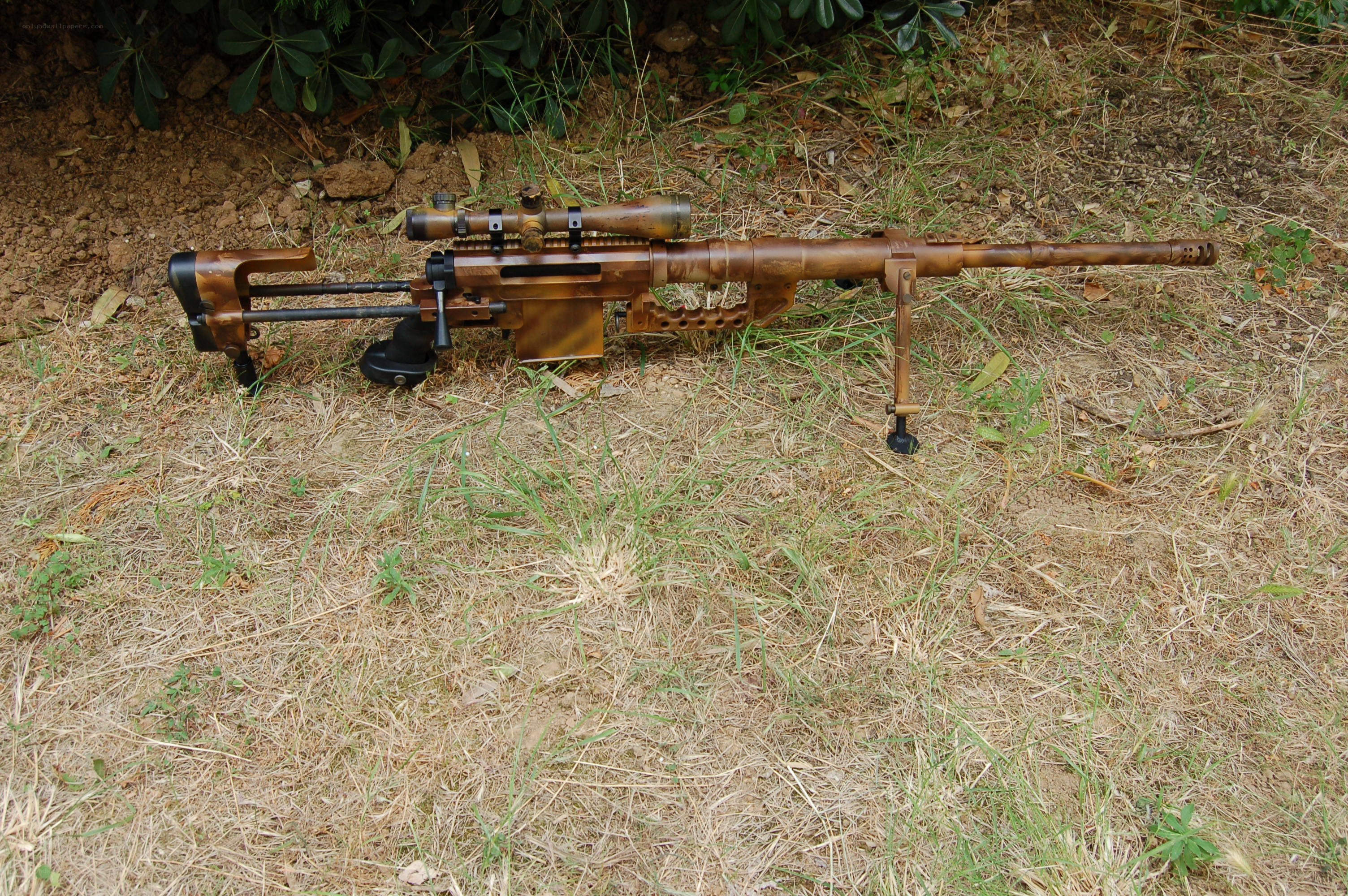 sniper rifle on grass
