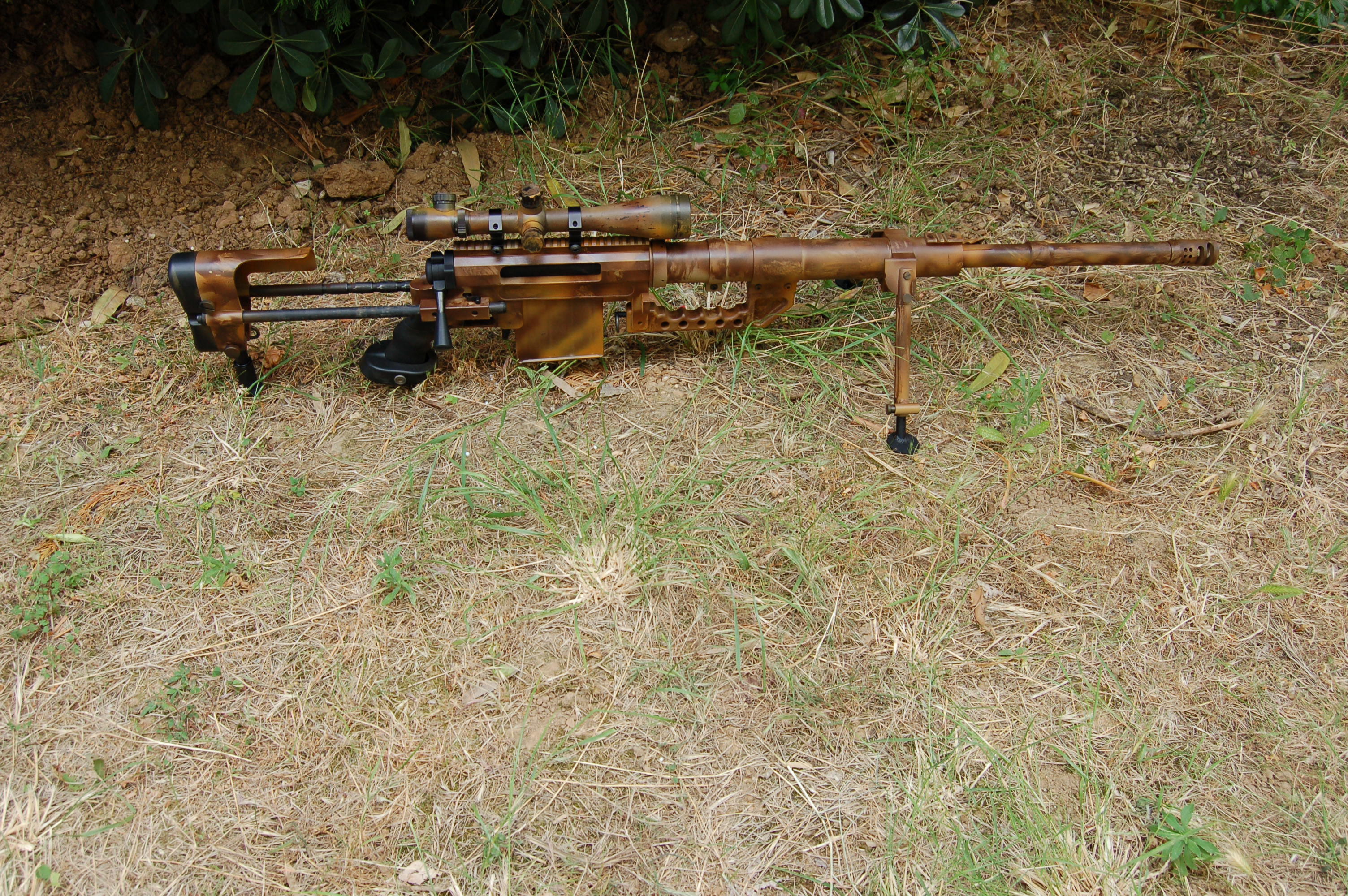 sniper rifle on grass