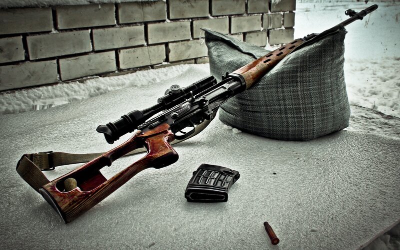 sniper rifle on sandbag