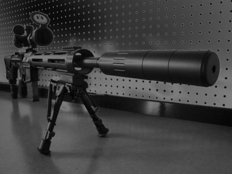 sniper rifle with suppressor