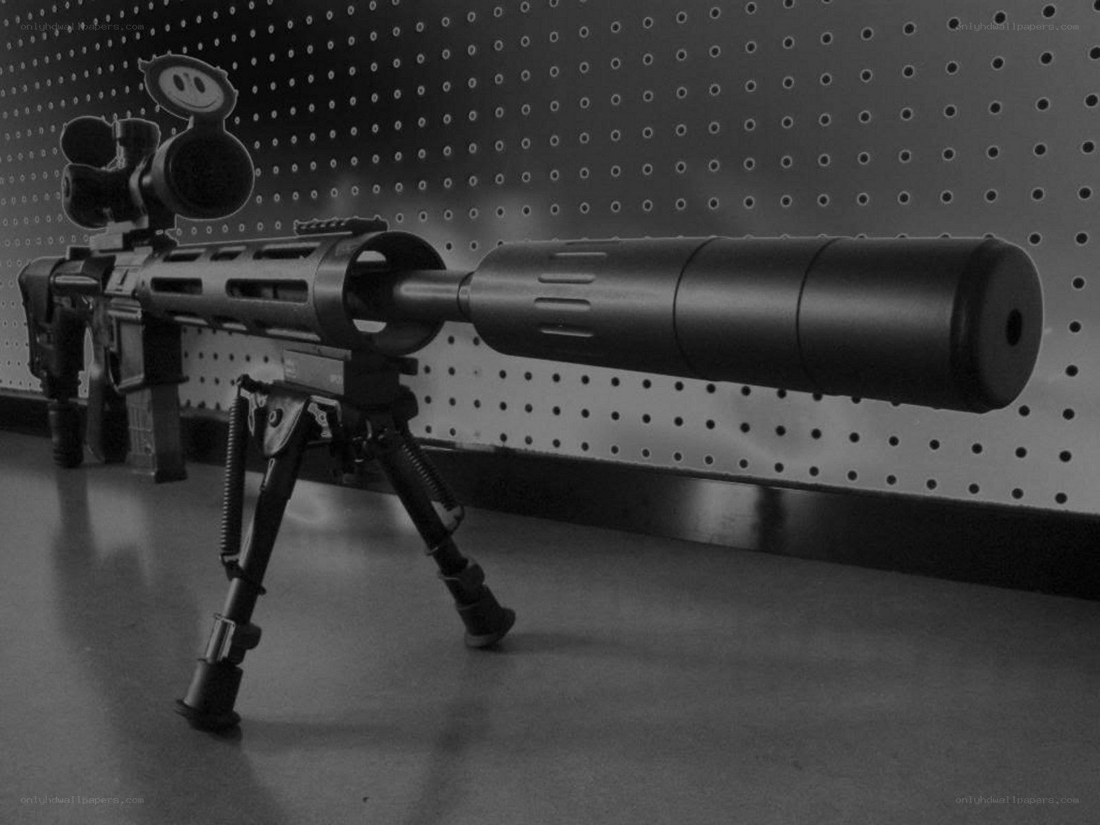sniper rifle with suppressor