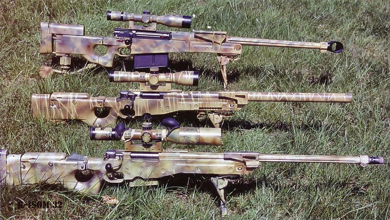 sniper rifles on grass