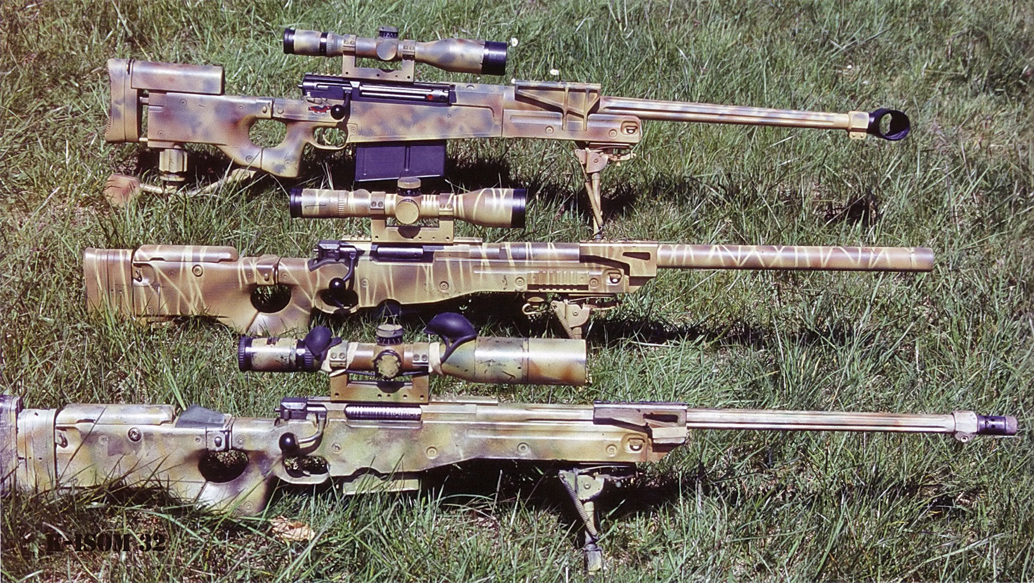 sniper rifles on grass