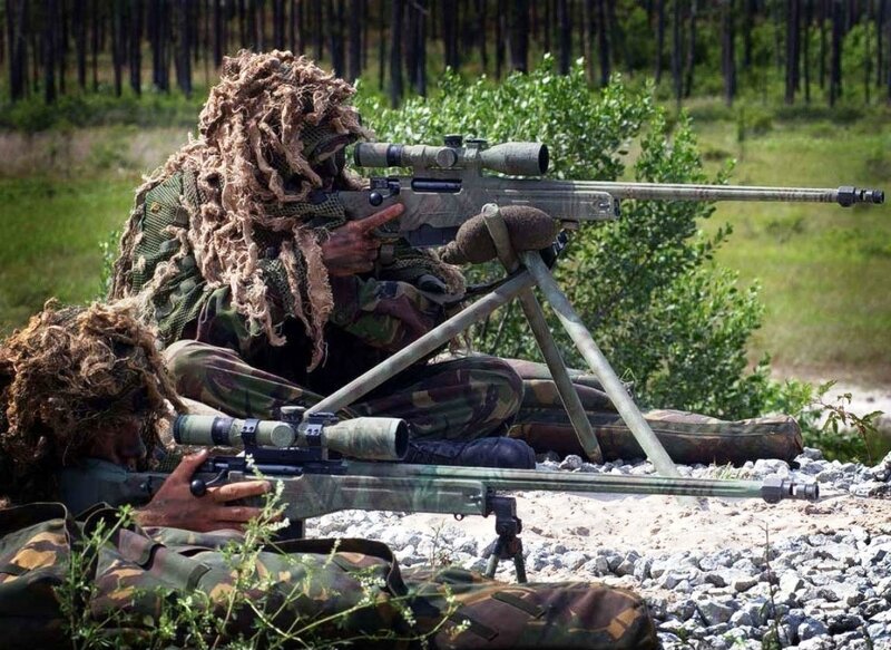 Snipers in camouflage gear