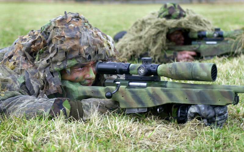 Snipers in camouflage gear