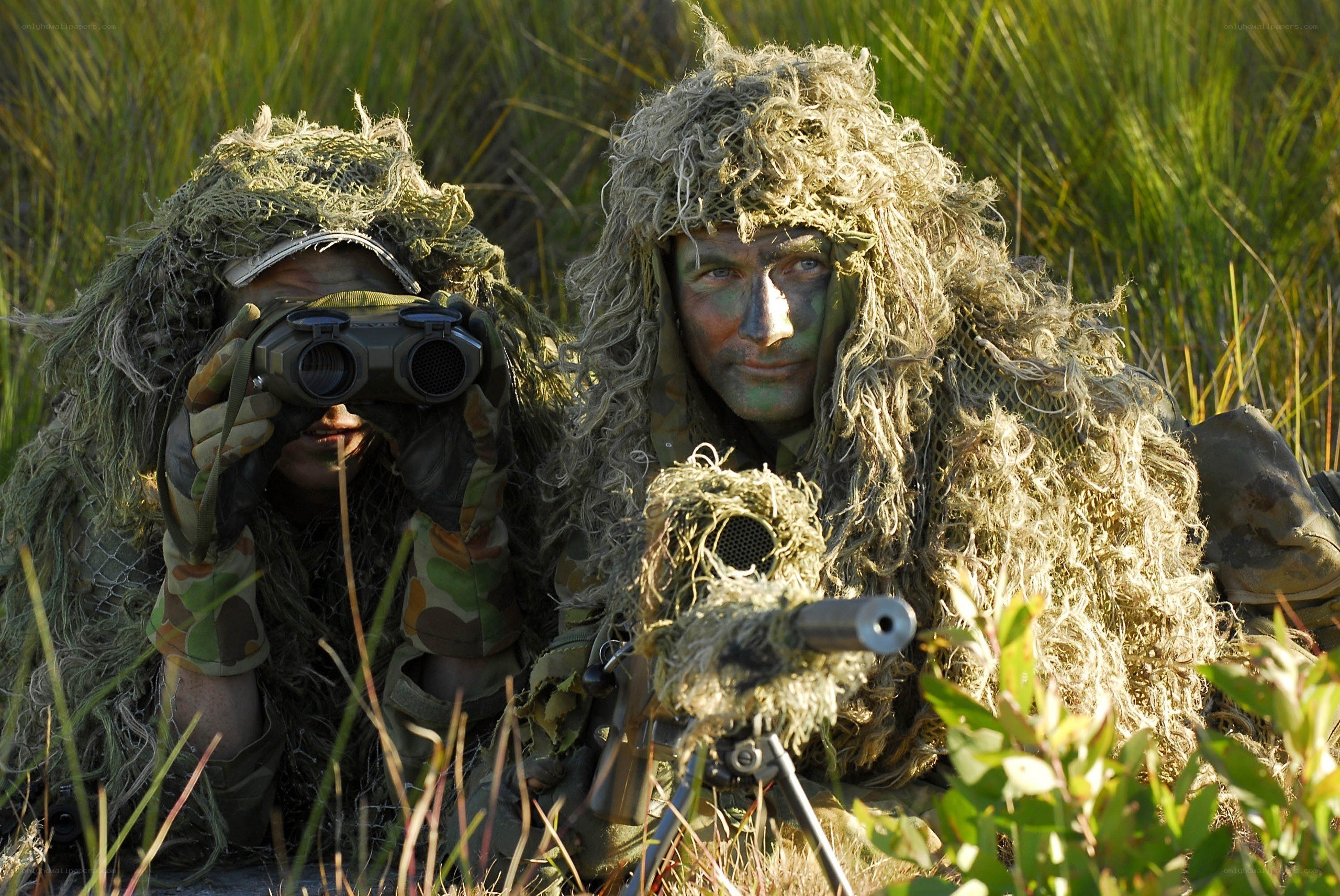 Snipers in camouflage gear