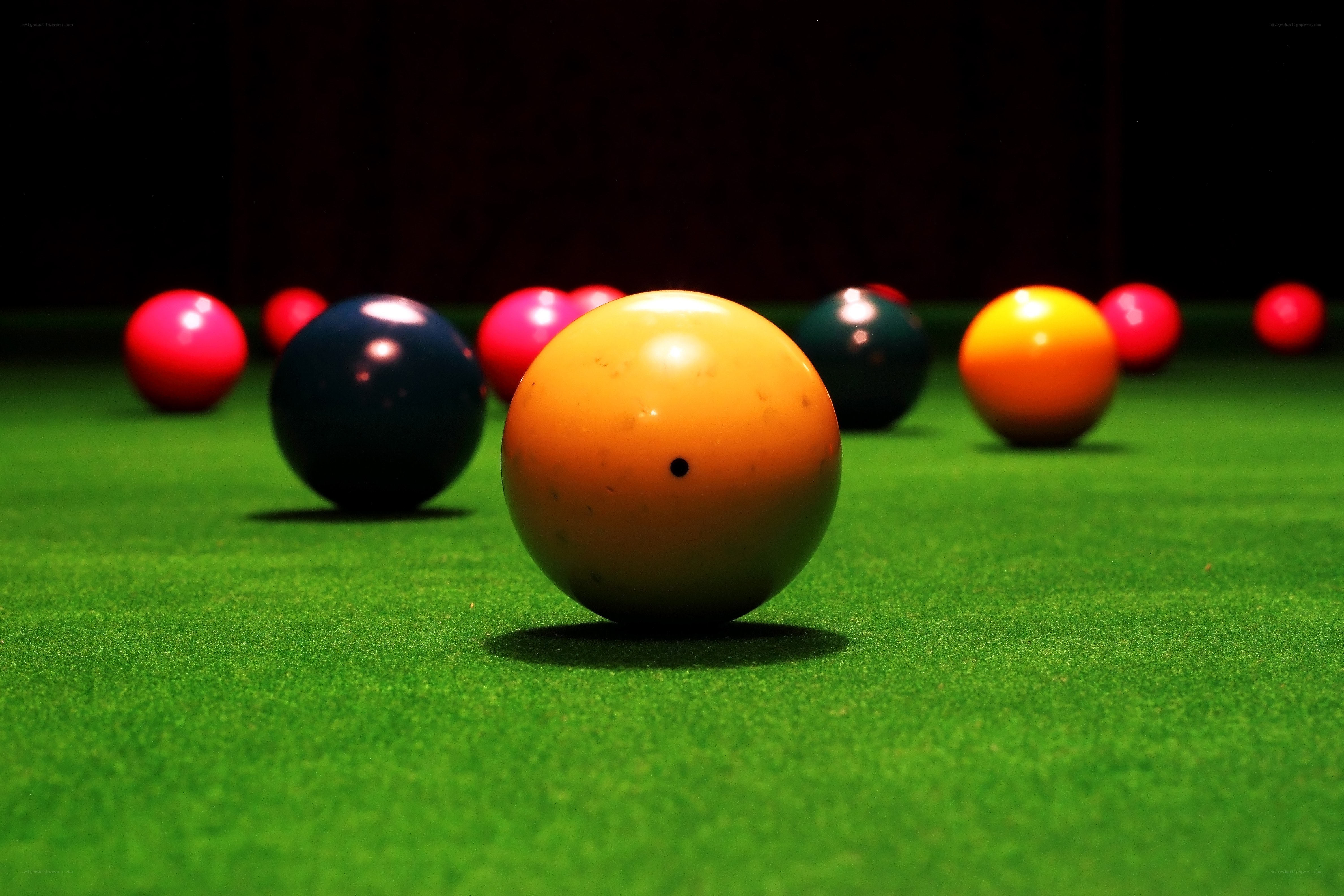 snooker balls on green table